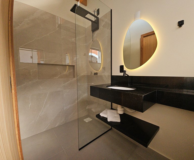 Loft com banheira hidro com praia no fim da rua