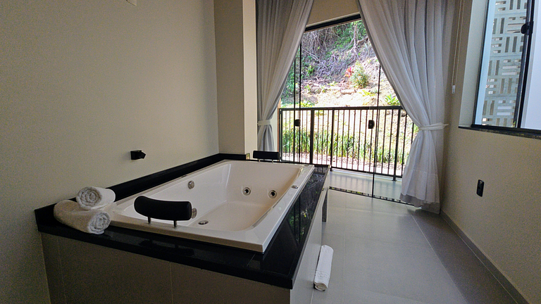 House with double hot tub, air conditioning, fireplace and b