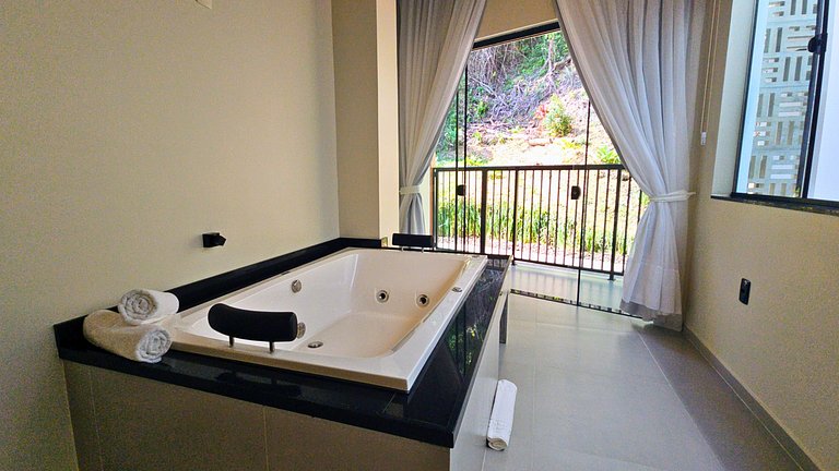 Casa con jacuzzi doble, aire acondicionado, chimenea y barba