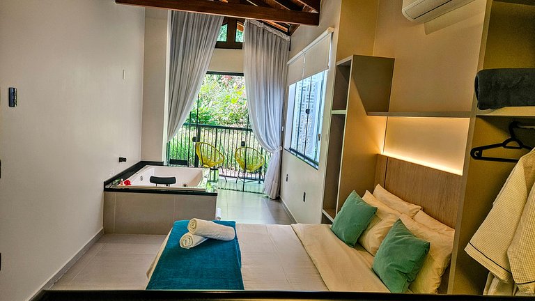 Two-story house with a whirlpool tub and barbecue area near